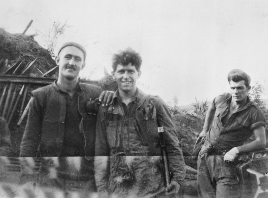 Cpl Ron Cashman MM (left) and Pte Eddie Wright don flak vests and grenades as they prepare for a night patrol into no man’s land from Hill 355 (Kowang San) known as ‘Little Gibraltar’. AWM P00964.003.