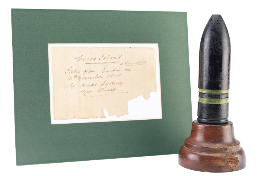 Despite the horrific scenes that faced them, many of HMAS 'Sydney'’s boarding party souvenired objects from the 'Emden'. This shell was one such souvenir. Along with a note from Glossop confirming its authenticity, the mounted shell was donated to the Anzac Memorial by Kerrie Jeffriess in 2018. Anzac Memorial Collection 2018.18.