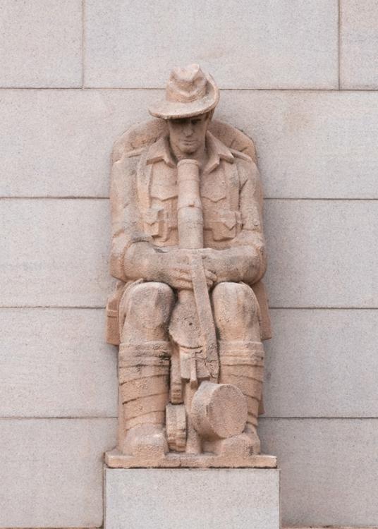 Photograph of the Lewis Gunner buttress sculpture on the Memorial's facade